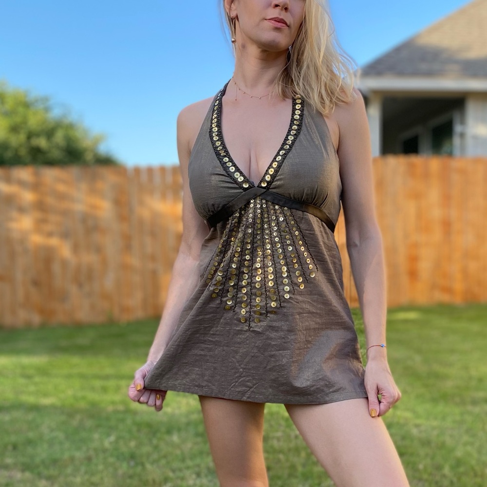 Cotton top with gold shine to it.